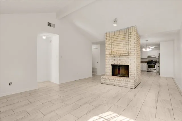 a view of a livingroom with a fireplace