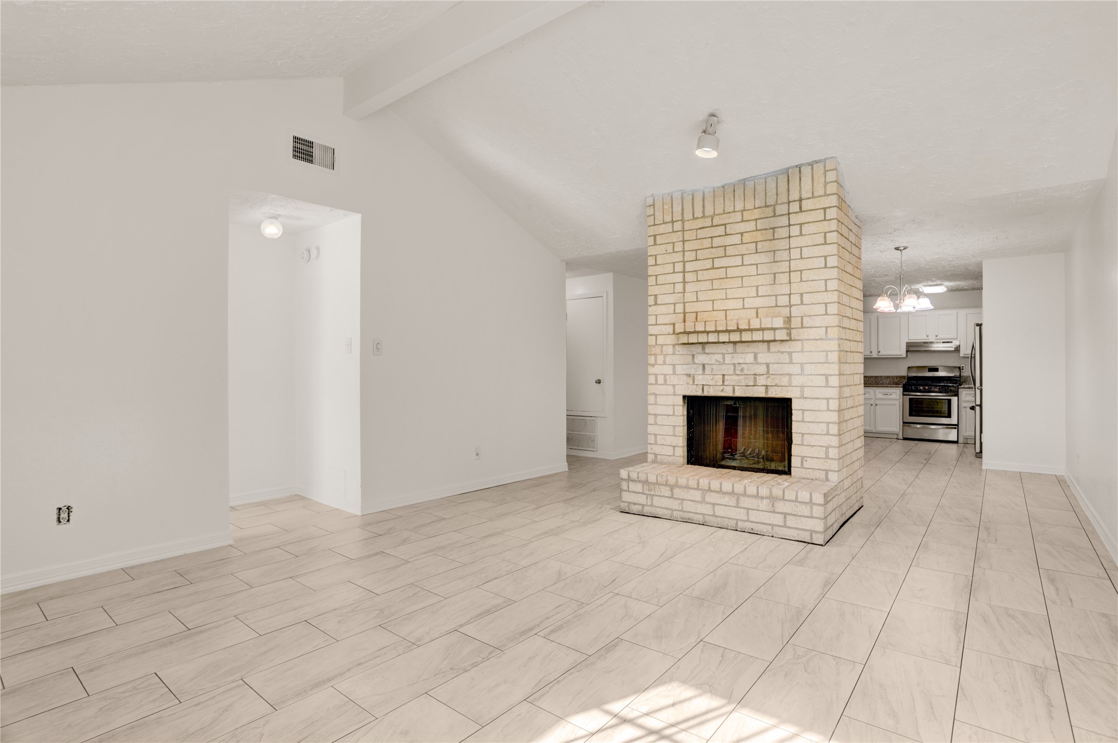 5437 Ridge Wind Lane Houston, TX 77053 - Photo 5 of 12 a view of a livingroom with a fireplace