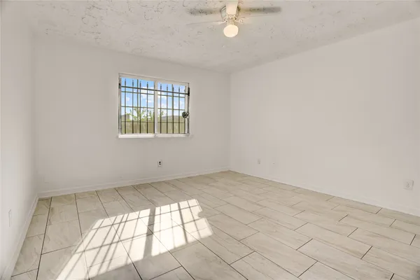 en empty room with windows
