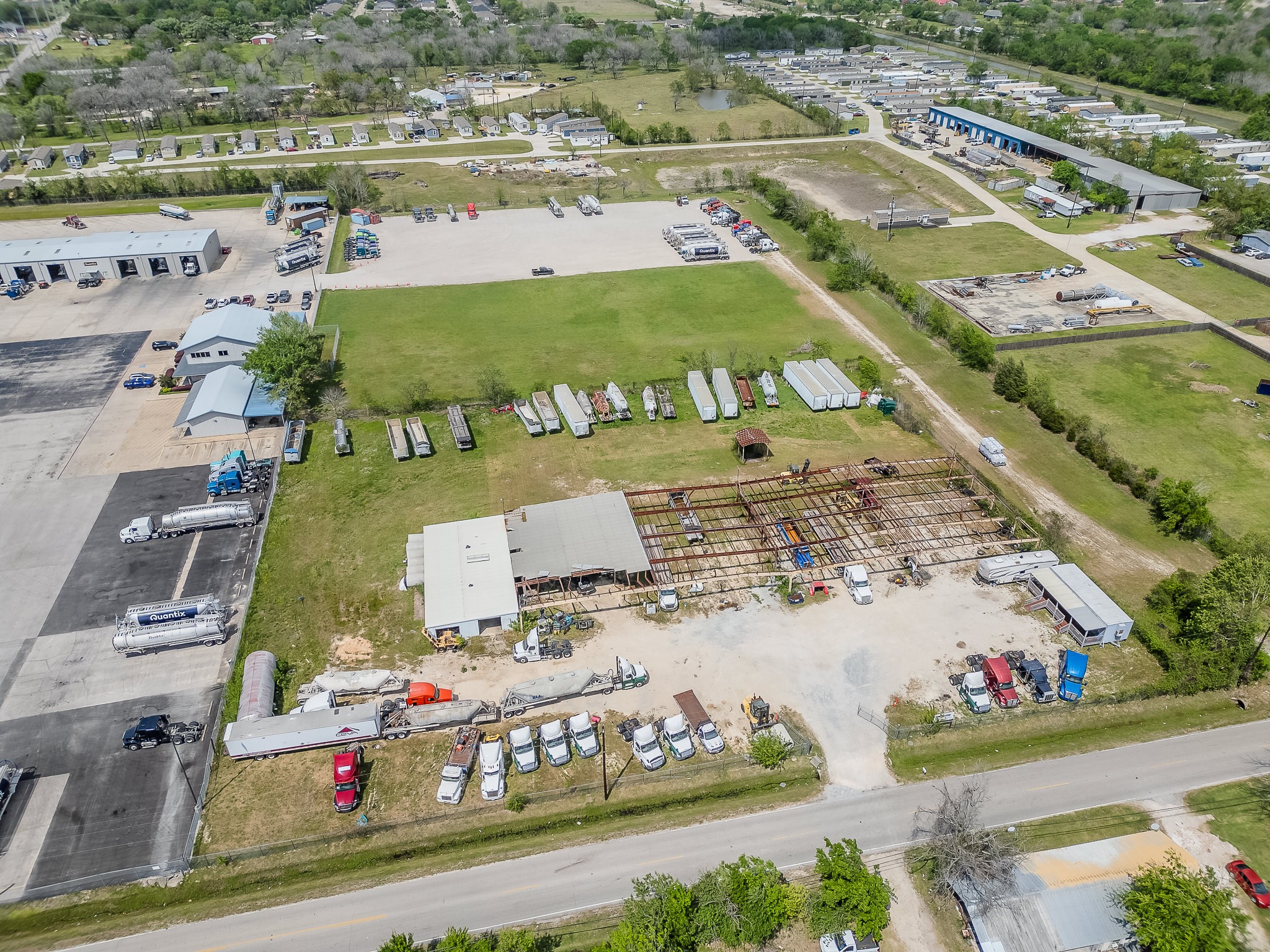 1116 North Battlebell Road Highlands, TX 77562 - Photo 20 of 23 This is an aerial view of a truck parking near on the same street . This is a perfect idea to show 1116 Battlebell's potential