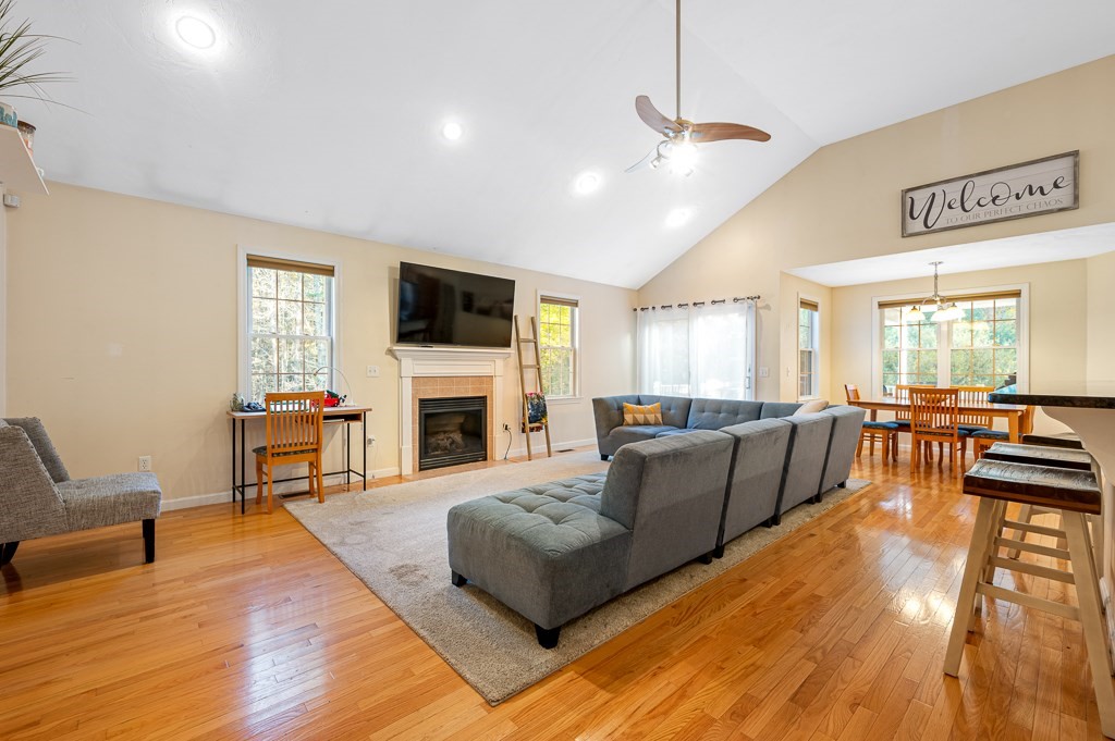 22 Mashapaug Road Sturbridge, MA 01566 - Photo 8 of 34 a living room with fireplace furniture and a flat screen tv