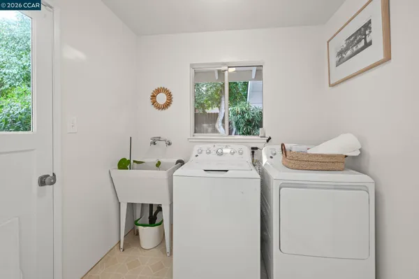 a utility room with dryer and washer