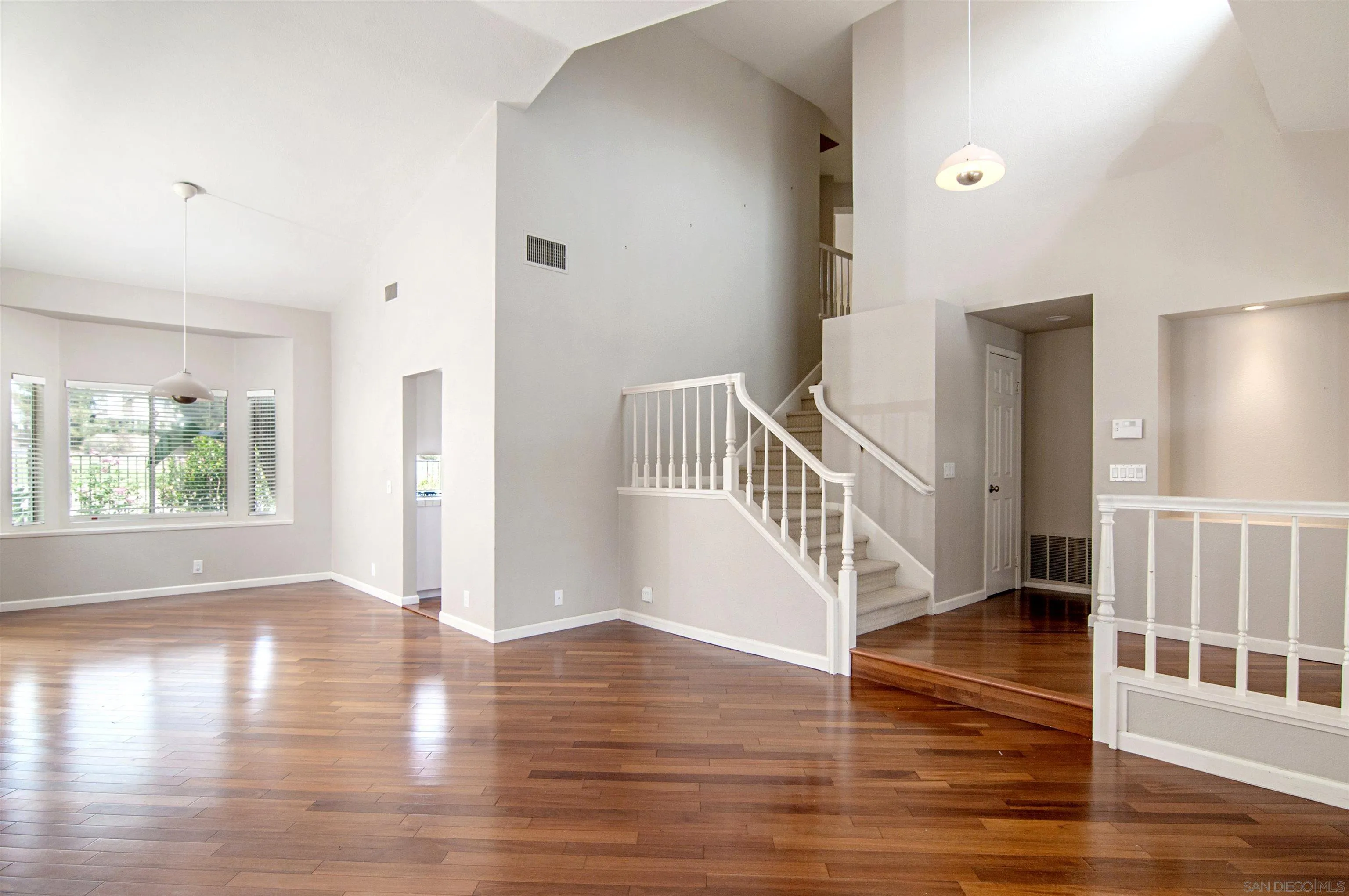 14530 Rutledge Square San Diego, CA 92128 - Photo 3 of 4 a view of entryway with wooden floor and stairs