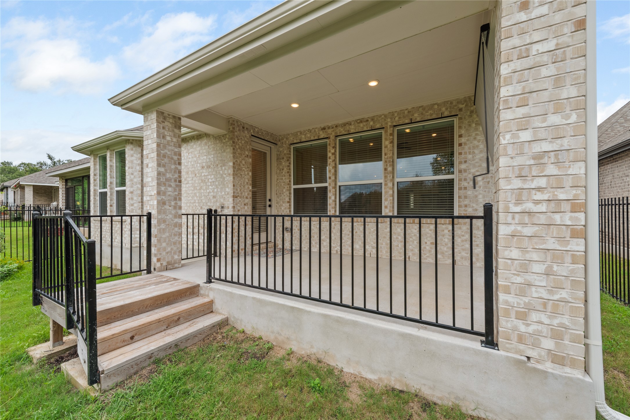 294 Kimble Creek Loop Kyle, TX 78640 - Photo 28 of 40 An inviting covered patio offers a relaxing outdoor retreat.