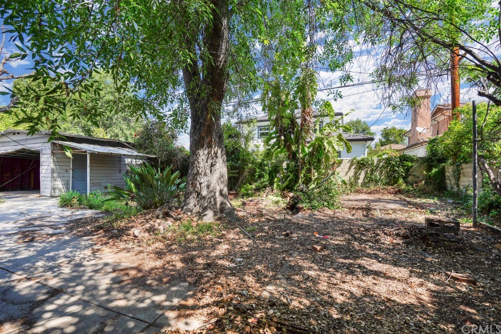 415 Alster Avenue Arcadia, CA 91006 - Photo 12 of 16 a view of a house with a tree