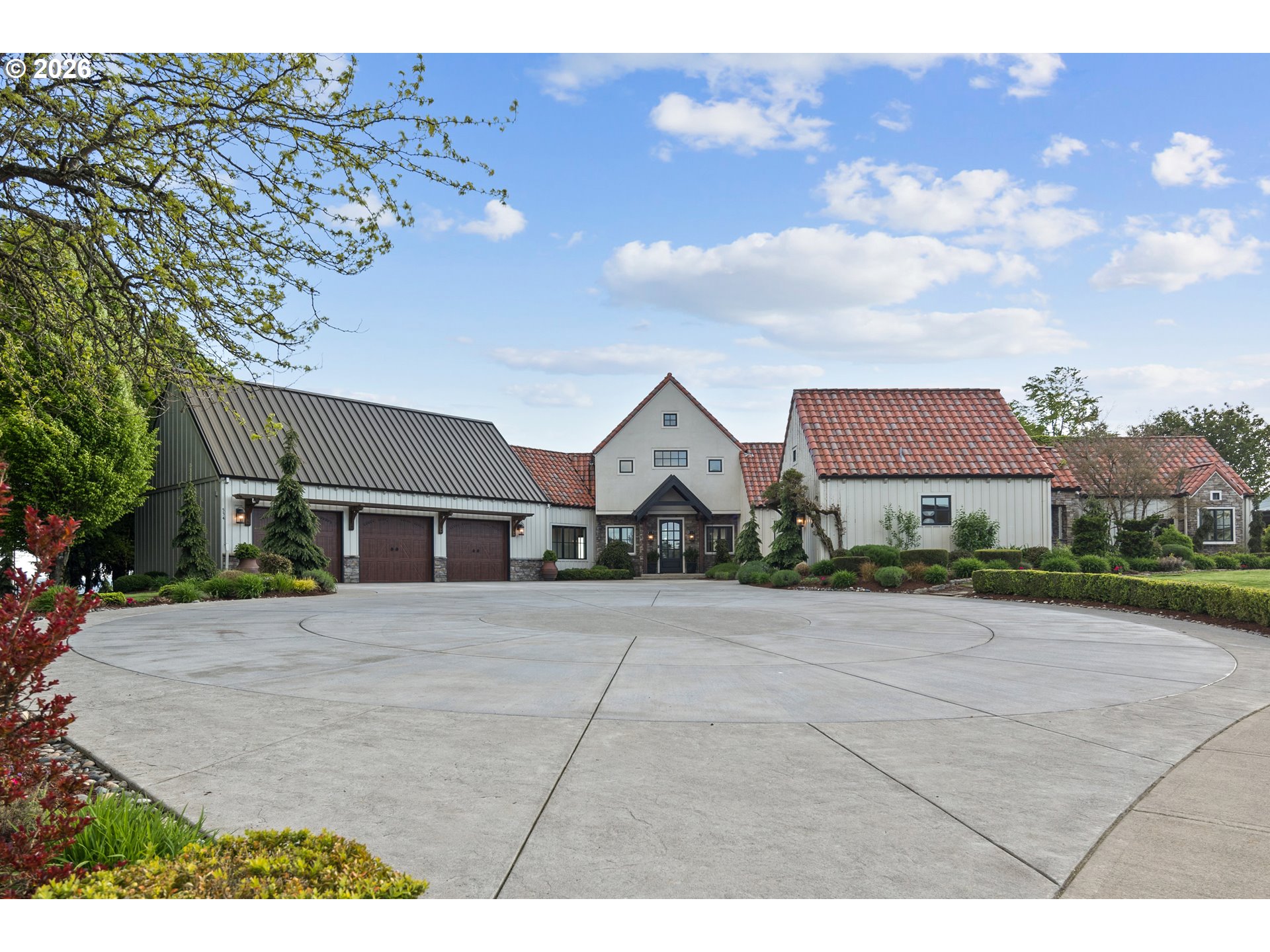 554 Northwest Dawson Ridge Drive Camas, WA 98607 - Photo 6 of 48 a front view of a house with a yard and garage