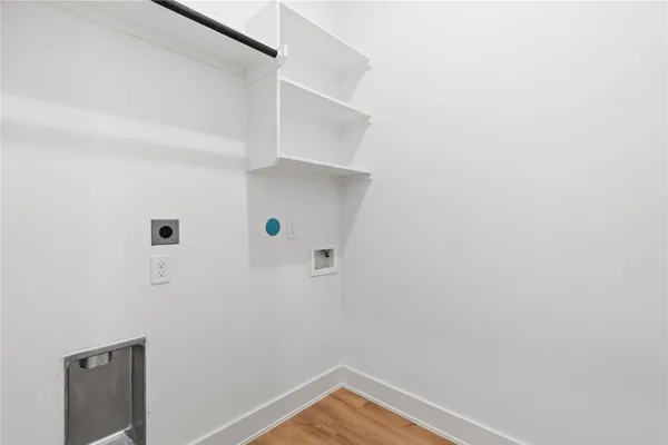 a view of small space with racks on the wall