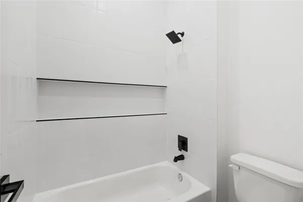 a bathroom with a bathtub