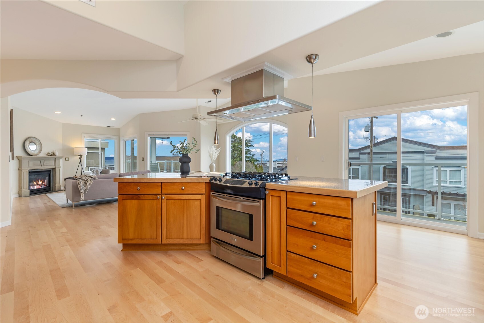 550 Dayton Street, Unit 201 Edmonds, WA 98020 - Photo 18 of 38 a kitchen with stainless steel appliances granite countertop a stove and cabinets