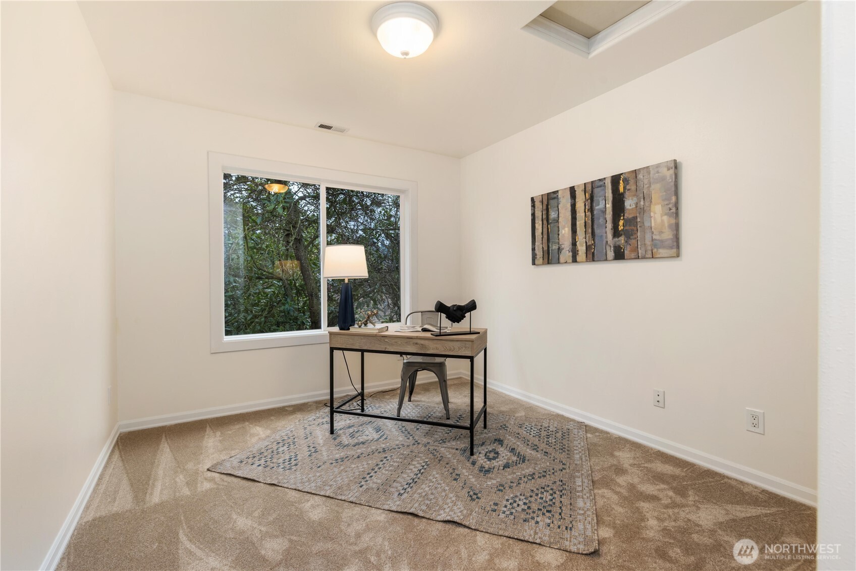 550 Dayton Street, Unit 201 Edmonds, WA 98020 - Photo 26 of 38 a living room with furniture and a window