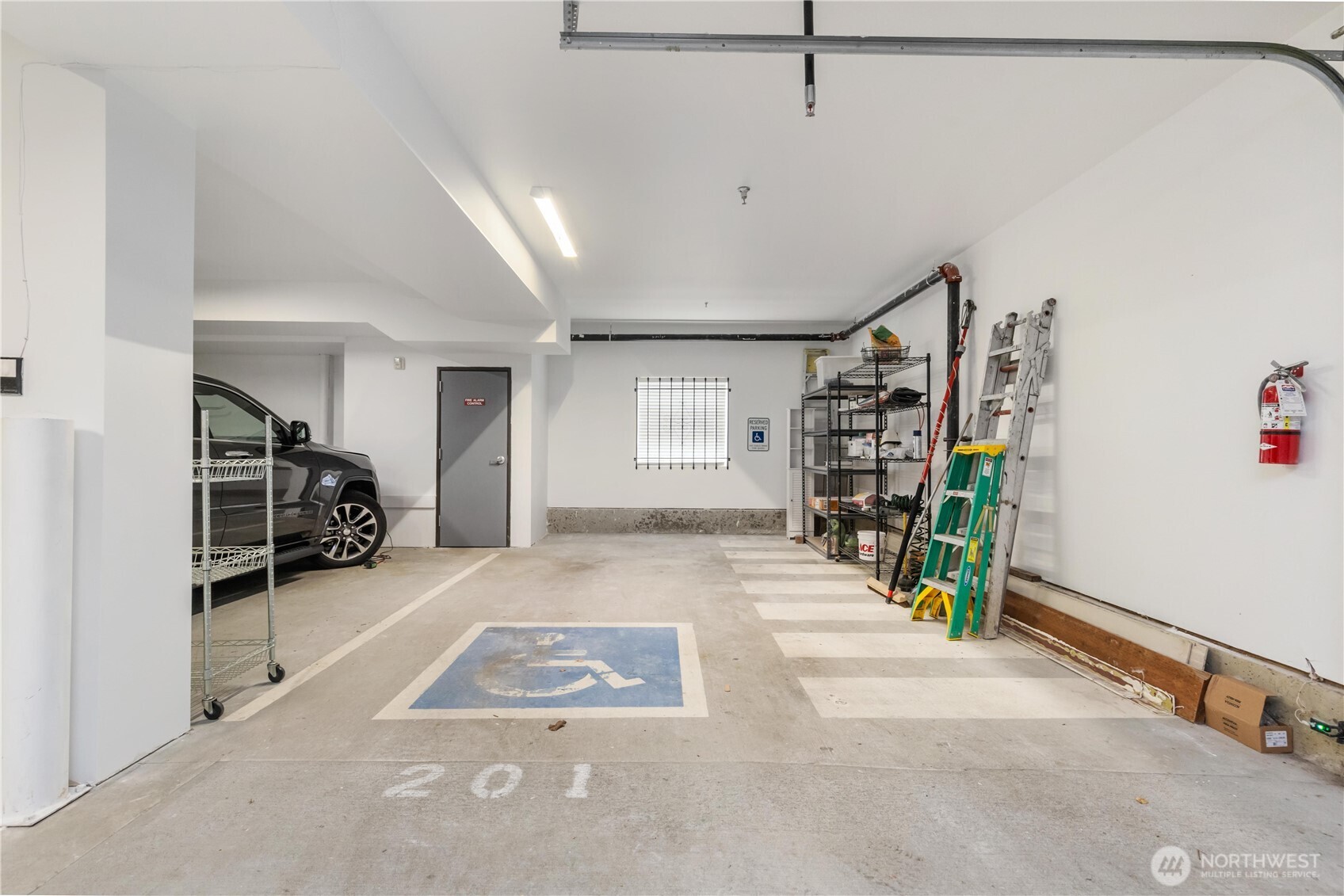 550 Dayton Street, Unit 201 Edmonds, WA 98020 - Photo 32 of 38 a view of livingroom with furniture and closet