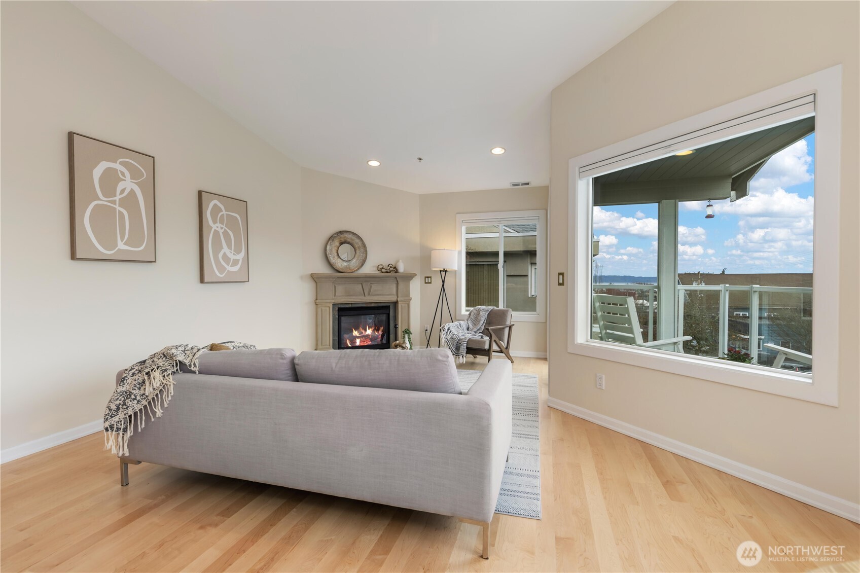550 Dayton Street, Unit 201 Edmonds, WA 98020 - Photo 7 of 38 a living room with furniture and a fireplace