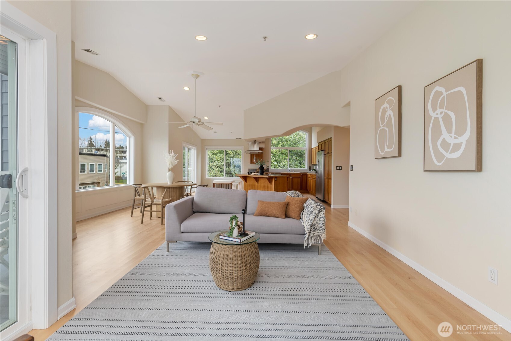 550 Dayton Street, Unit 201 Edmonds, WA 98020 - Photo 9 of 38 a living room with furniture large window and wooden floor