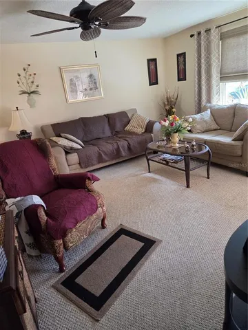 a living room with furniture and a couch