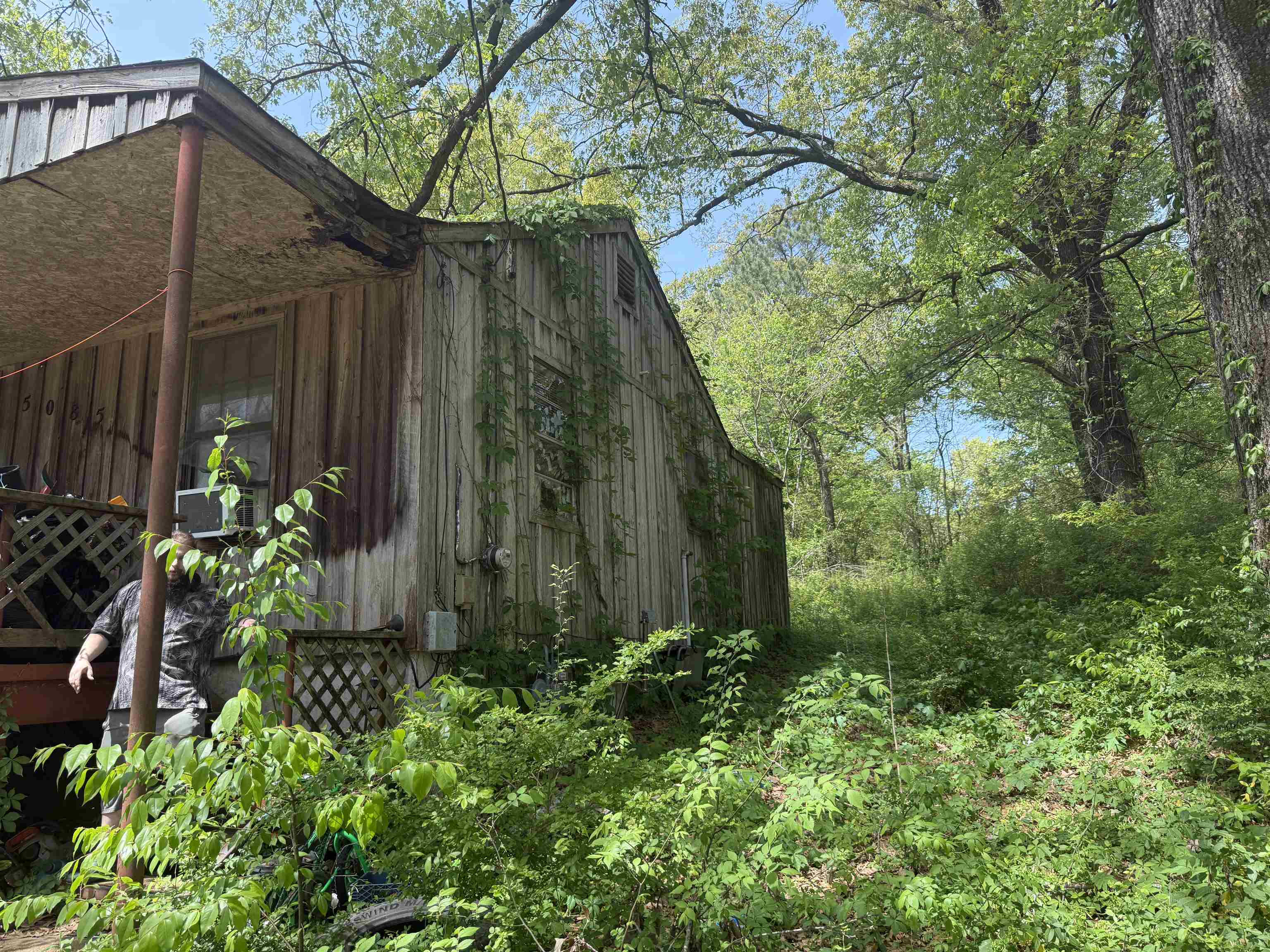 5085 Clinton Road Memphis, TN 38109 - Photo 36 of 36 View of home's exterior with a barn