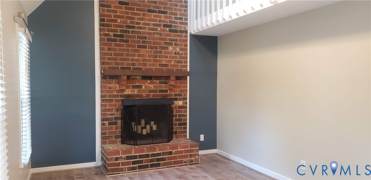 7166 Full Rack Drive Midlothian, VA 23112 - Photo 3 of 19 a living room with a fireplace