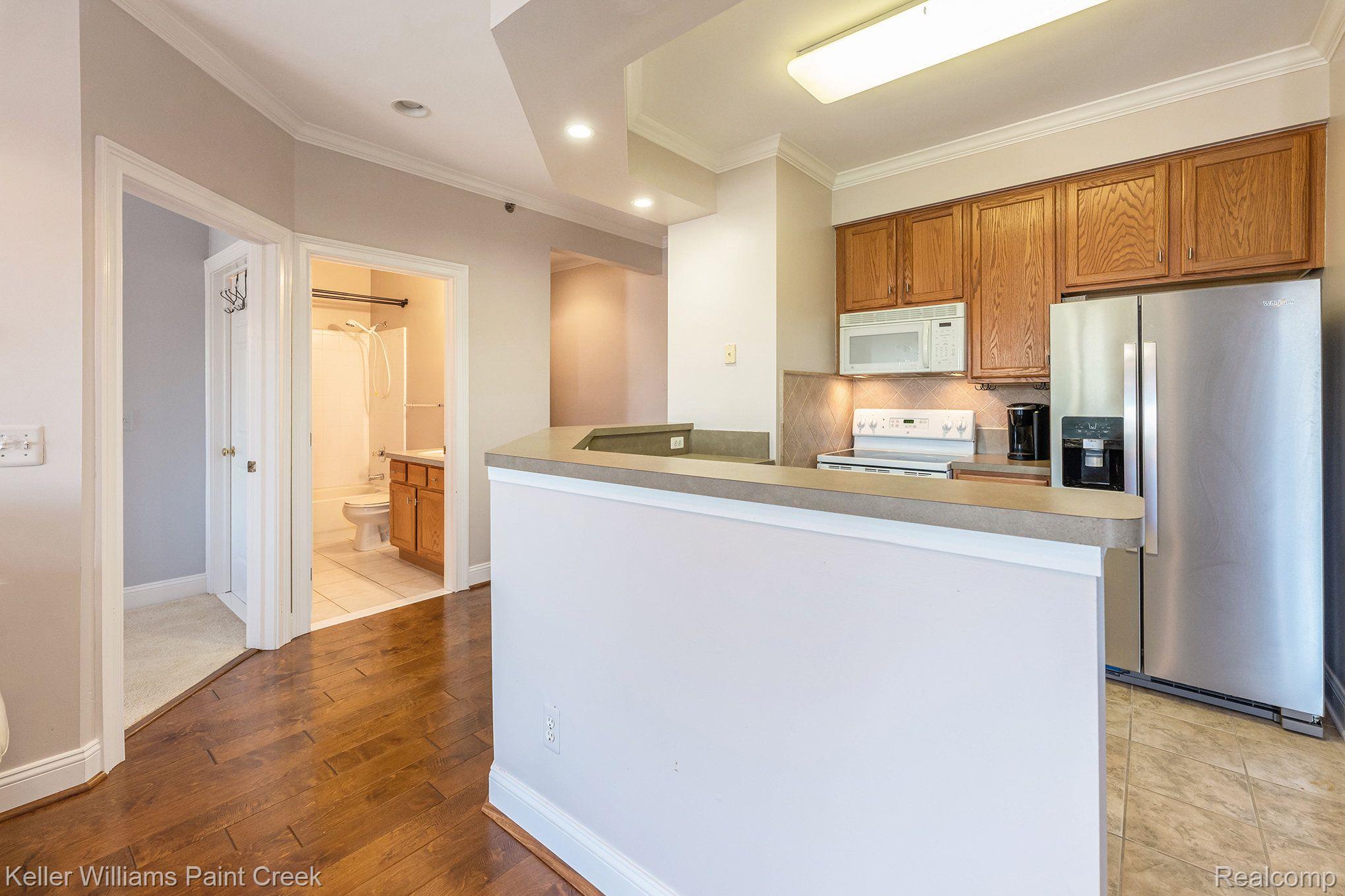 39160 Hayes Road Clinton Township, MI 48038 - Photo 32 of 35 Suite includes high ceilings with Open floor plan