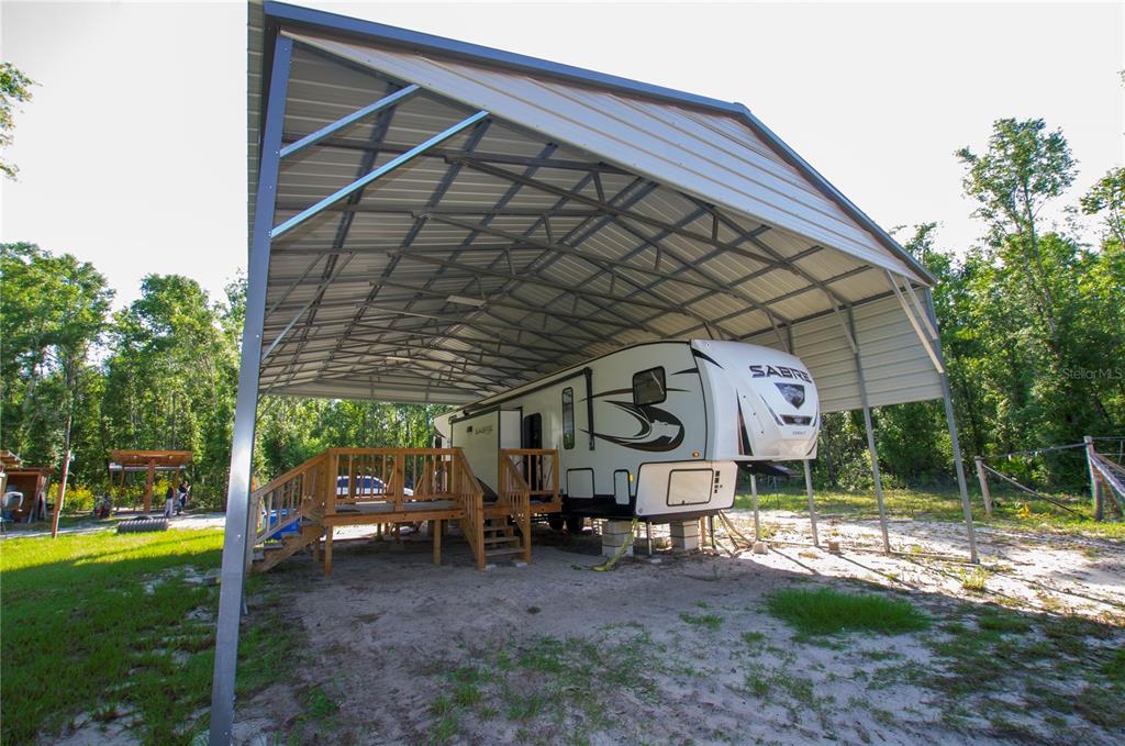 18233 185th Road Live Oak, FL 32060 - Photo 14 of 99 a view of a house with backyard
