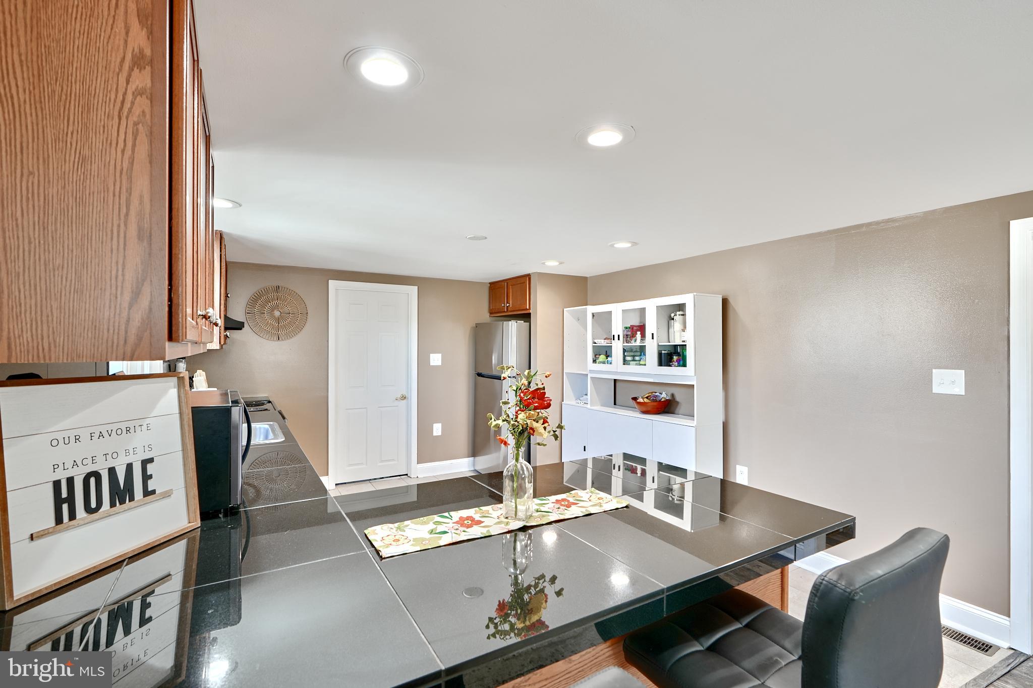 7204 Orth Road Sparrows Point, MD 21219 - Photo 13 of 29 Breakfast bar & kitchen
