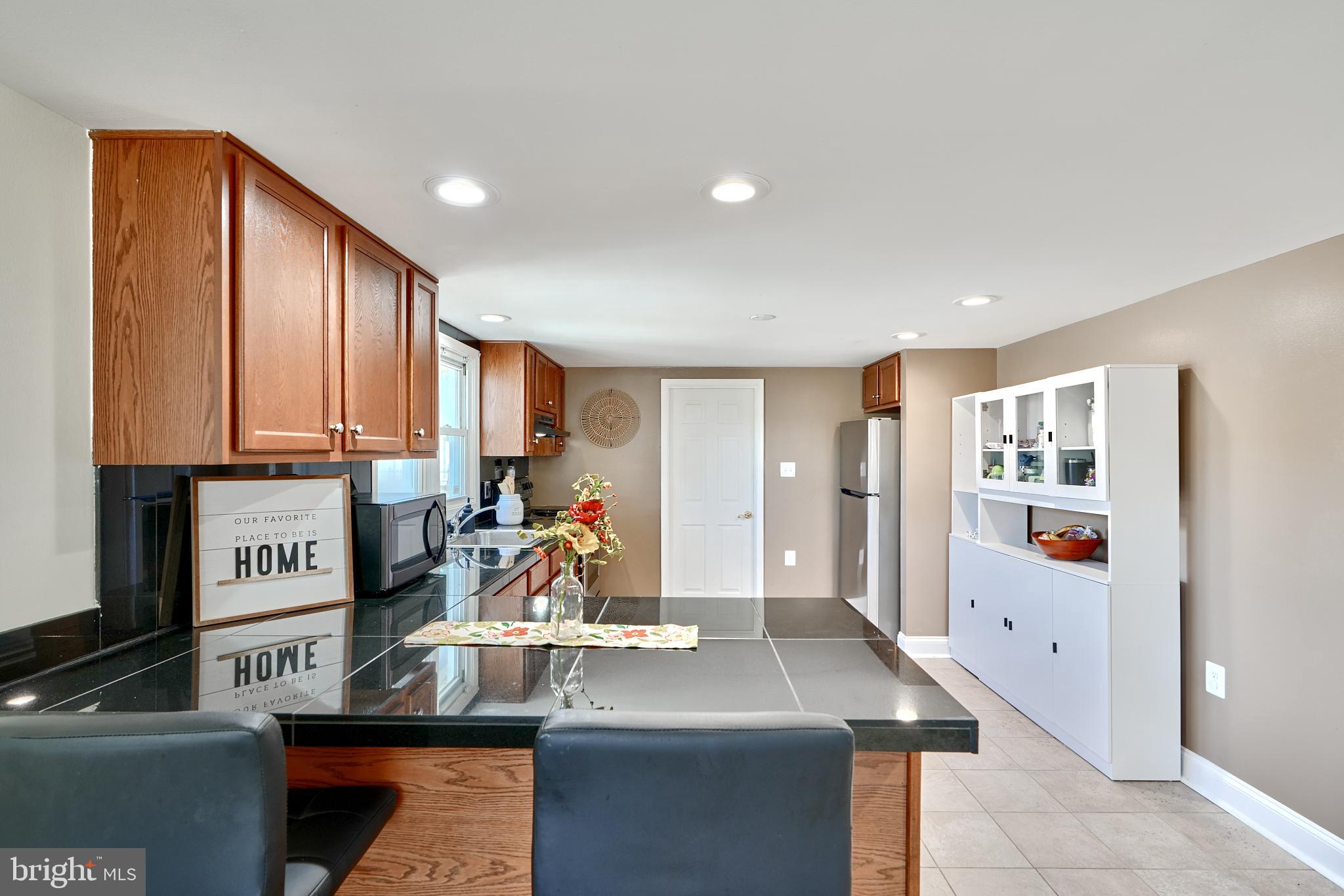 7204 Orth Road Sparrows Point, MD 21219 - Photo 14 of 29 Breakfast bar & kitchen