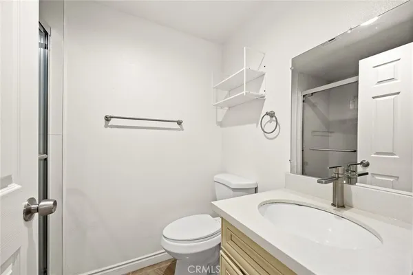 a bathroom with a sink and a toilet