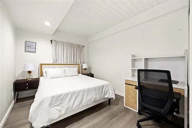 an aerial view of a house with a ocean view