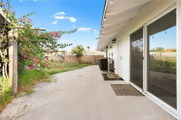 a view of a porch with a yard