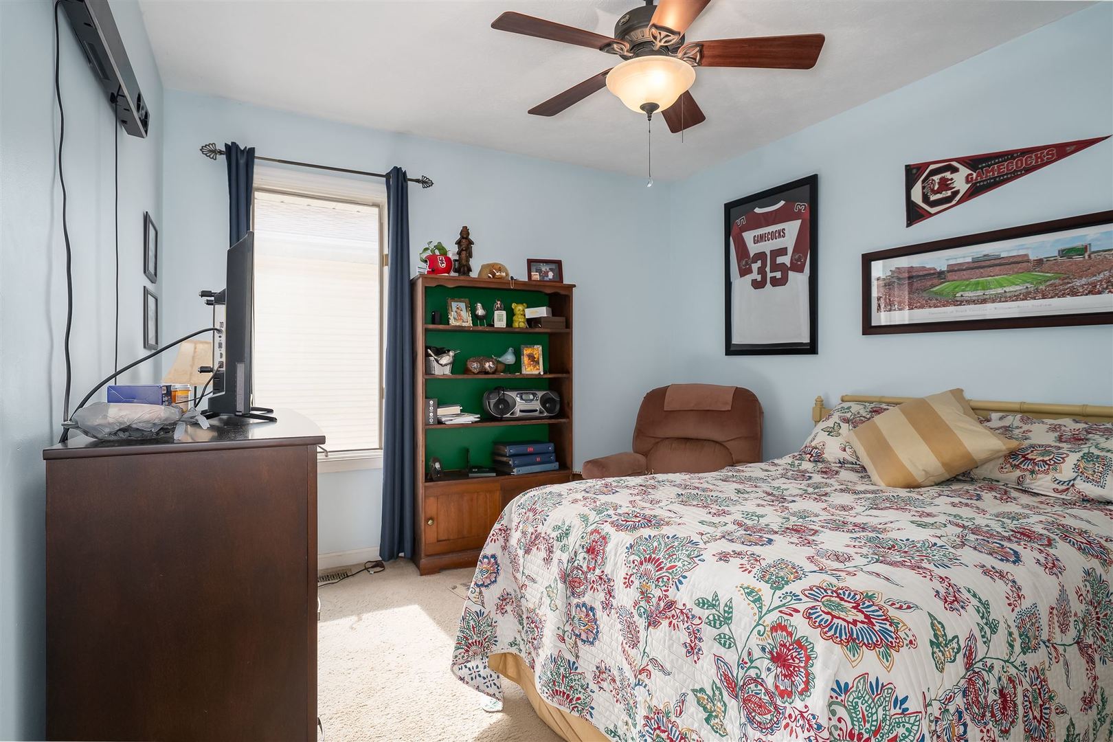 106 North Blair Drive, Unit 2 Normal, IL 61761 - Photo 11 of 22 a bedroom with a bed and dresser with mirror