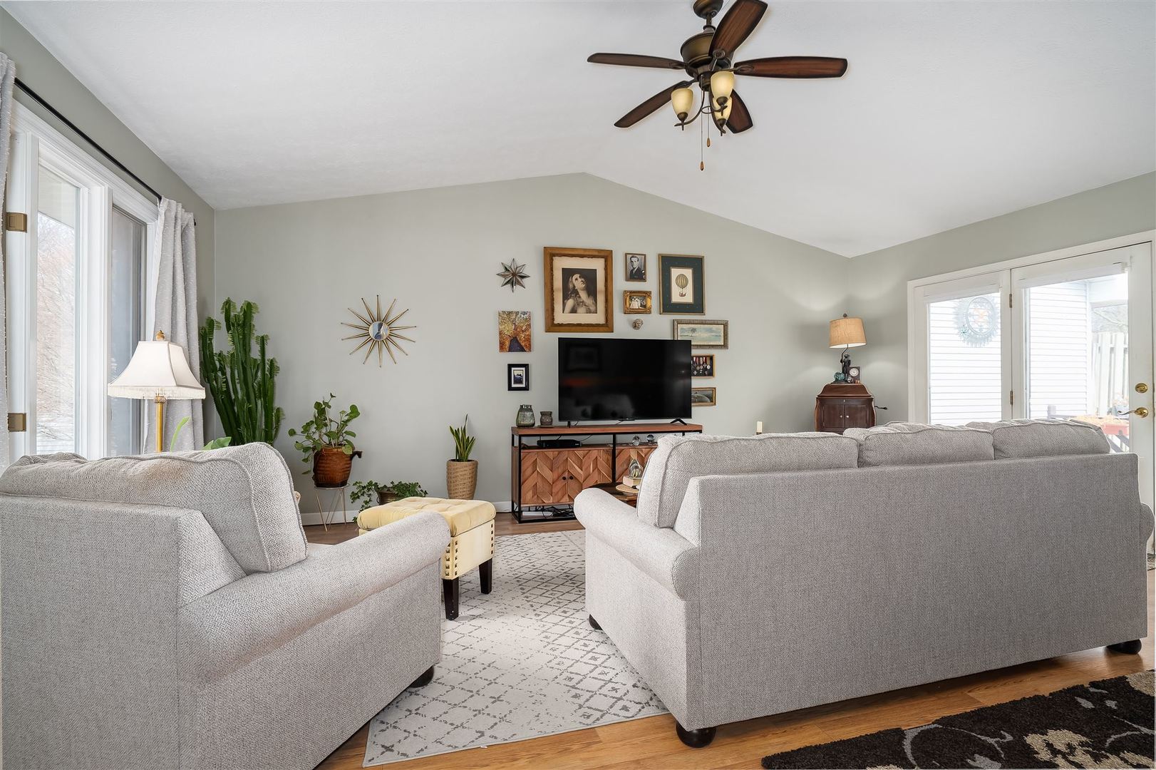 106 North Blair Drive, Unit 2 Normal, IL 61761 - Photo 8 of 22 a living room with furniture and a flat screen tv