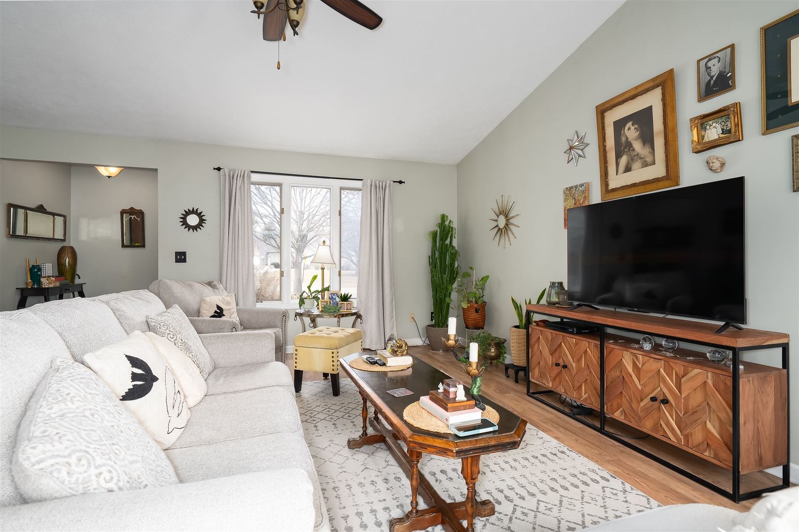 106 North Blair Drive, Unit 2 Normal, IL 61761 - Photo 10 of 22 a living room with furniture and a flat screen tv