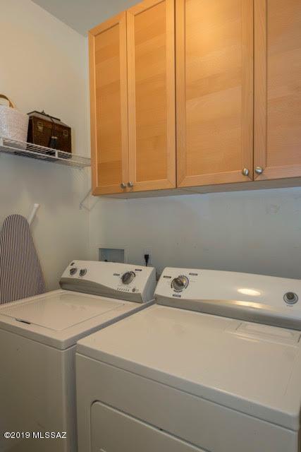 3701 East Northern Dancer Road Tucson, AZ 85739 - Photo 19 of 32 a utility room with dryer and washer
