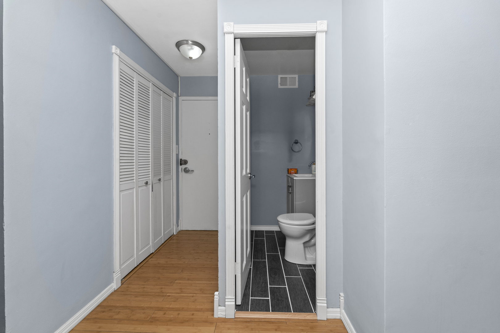 3950 North Lake Shore Drive, Unit 228 Chicago, IL 60613 - Photo 16 of 28 a view of a bathroom from a hallway