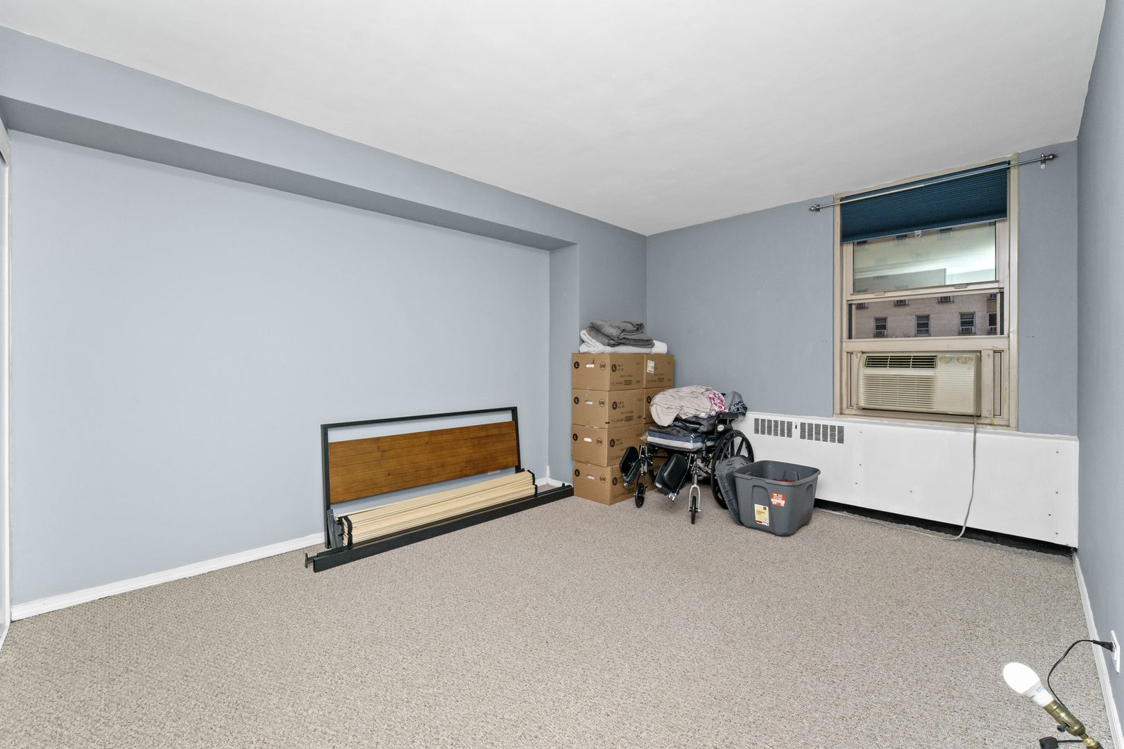 3950 North Lake Shore Drive, Unit 228 Chicago, IL 60613 - Photo 19 of 28 a living room with furniture and a window