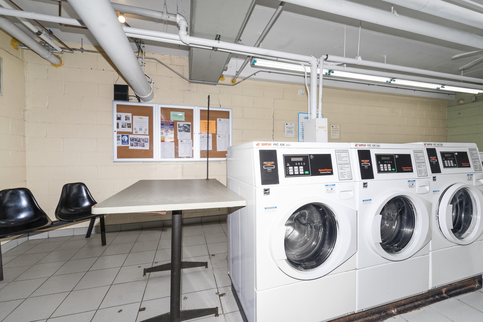3950 North Lake Shore Drive, Unit 228 Chicago, IL 60613 - Photo 25 of 28 a utility room with dryer and washer