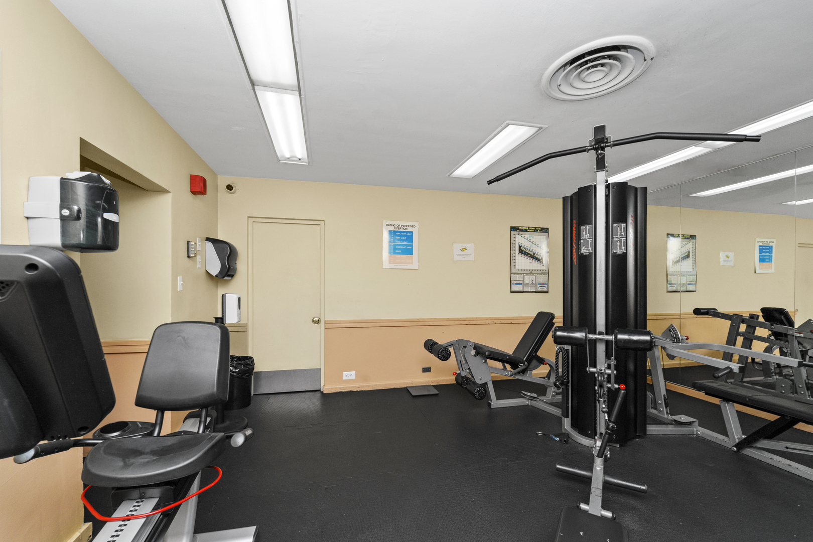 3950 North Lake Shore Drive, Unit 228 Chicago, IL 60613 - Photo 26 of 28 a view of a room with gym equipment
