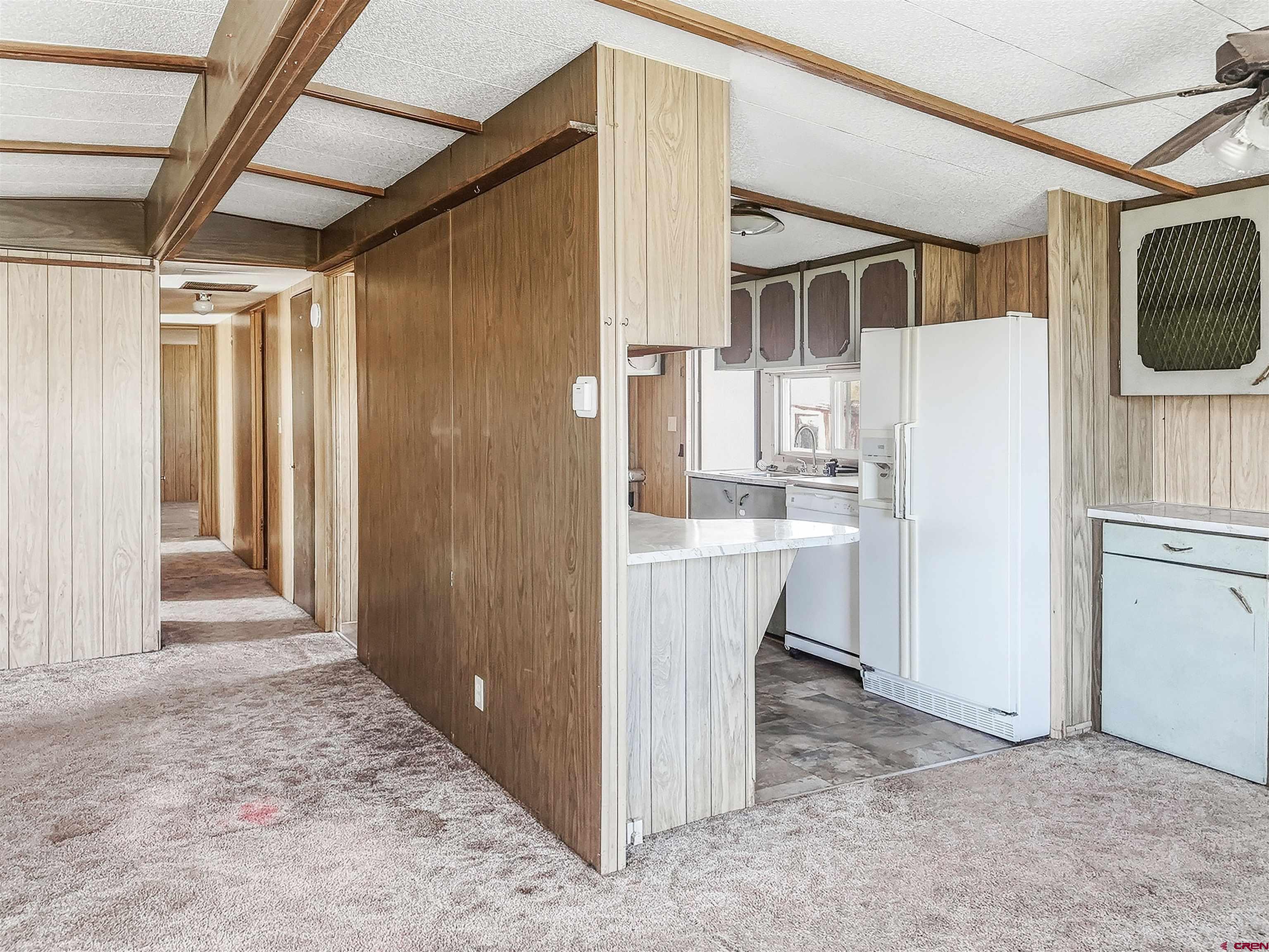 1318 Jackson Street Cortez, CO 81321 - Photo 5 of 13 a view of a storage and utility room with stainless steel appliances