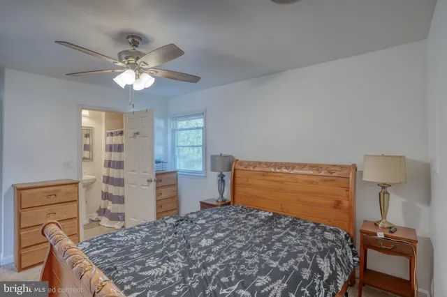 a bedroom with a bed and a cabinets