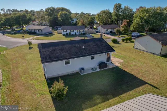 a view of a swimming pool with seating area