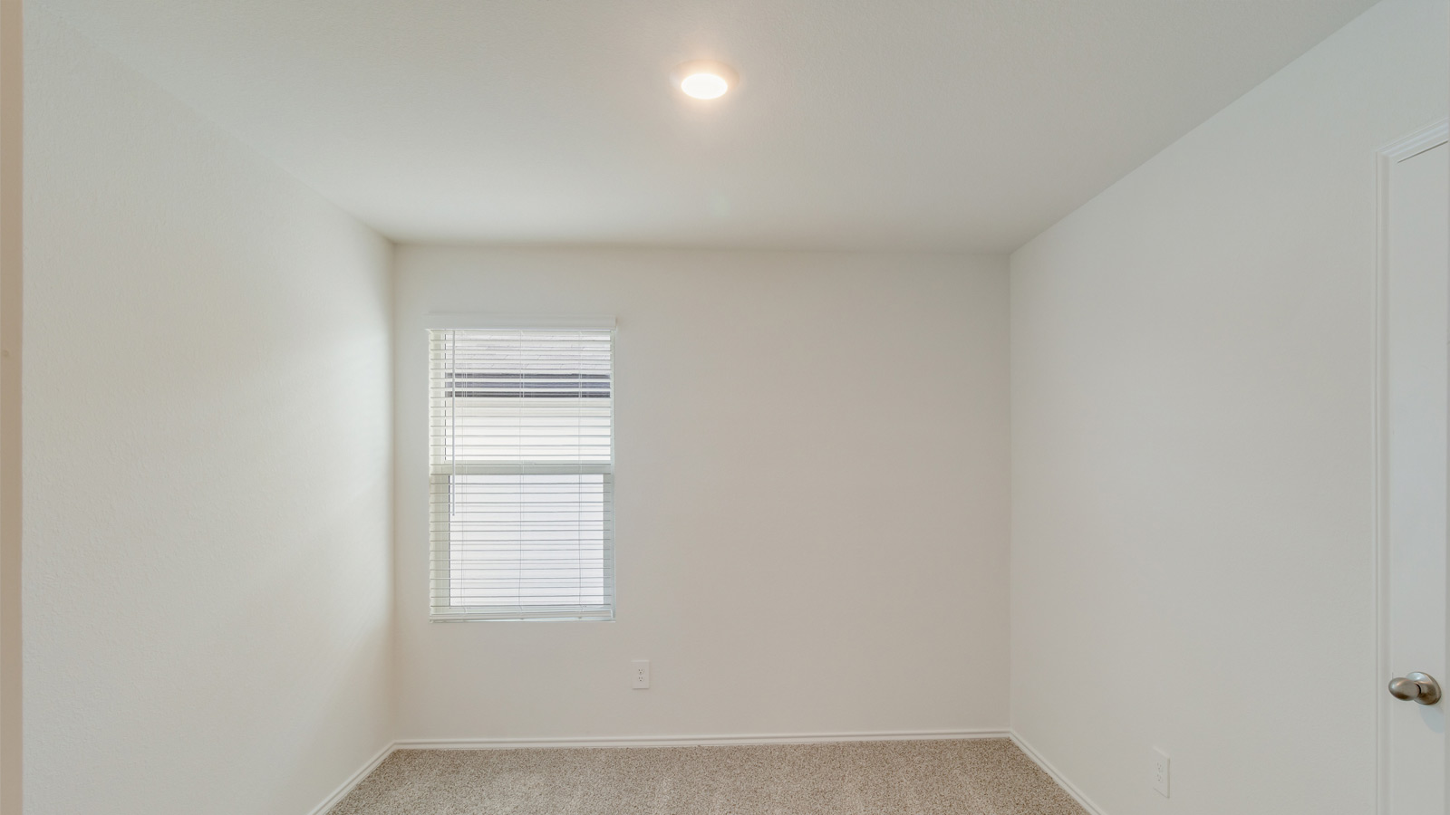 456 Sandringham Loop Kyle, TX 78640 - Photo 12 of 22 a view of an empty room with a window