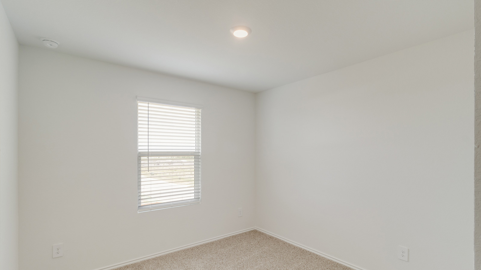 456 Sandringham Loop Kyle, TX 78640 - Photo 13 of 22 an empty room with a window