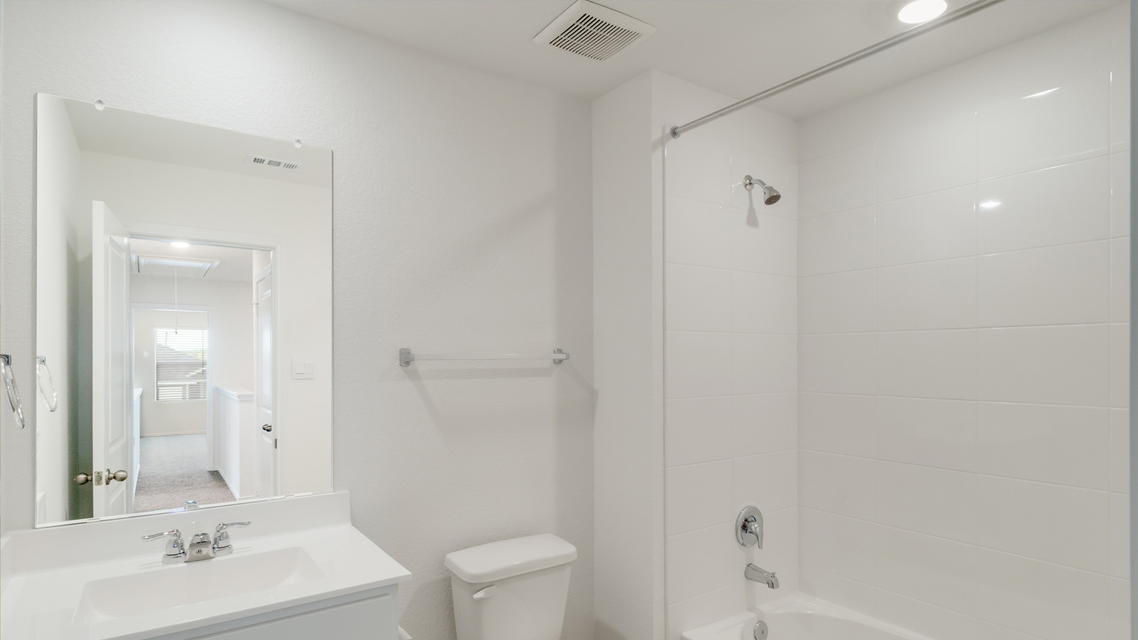 456 Sandringham Loop Kyle, TX 78640 - Photo 14 of 22 a bathroom with a sink a toilet and shower