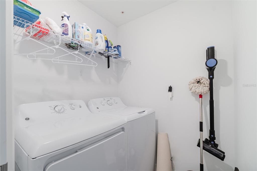 43992 Boardwalk Loop, Unit 1526 Punta Gorda, FL 33982 - Photo 17 of 48 a utility room with dryer and washer