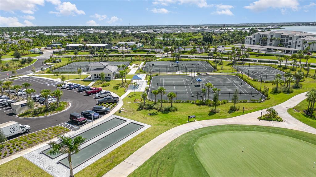 43992 Boardwalk Loop, Unit 1526 Punta Gorda, FL 33982 - Photo 29 of 48 an aerial view of a house with a swimming pool yard and outdoor seating