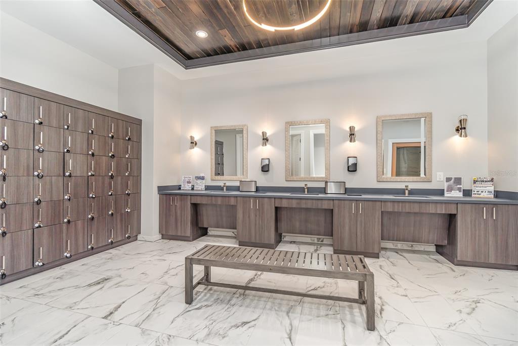 43992 Boardwalk Loop, Unit 1526 Punta Gorda, FL 33982 - Photo 36 of 48 a lobby with a couch and chandelier