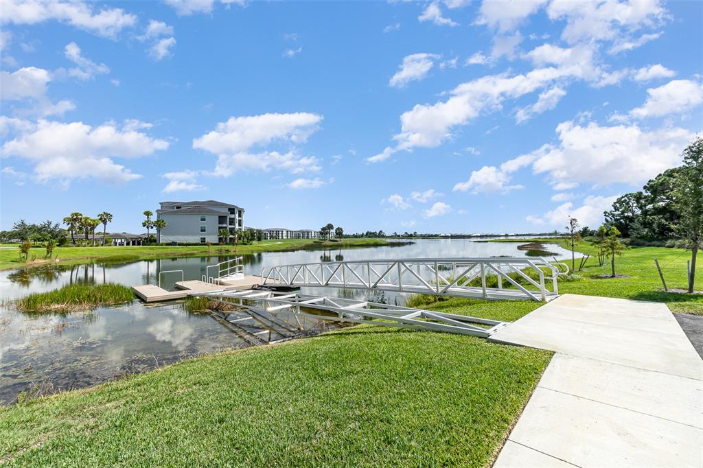 43992 Boardwalk Loop, Unit 1526 Punta Gorda, FL 33982 - Photo 41 of 48 a view of a lake with houses
