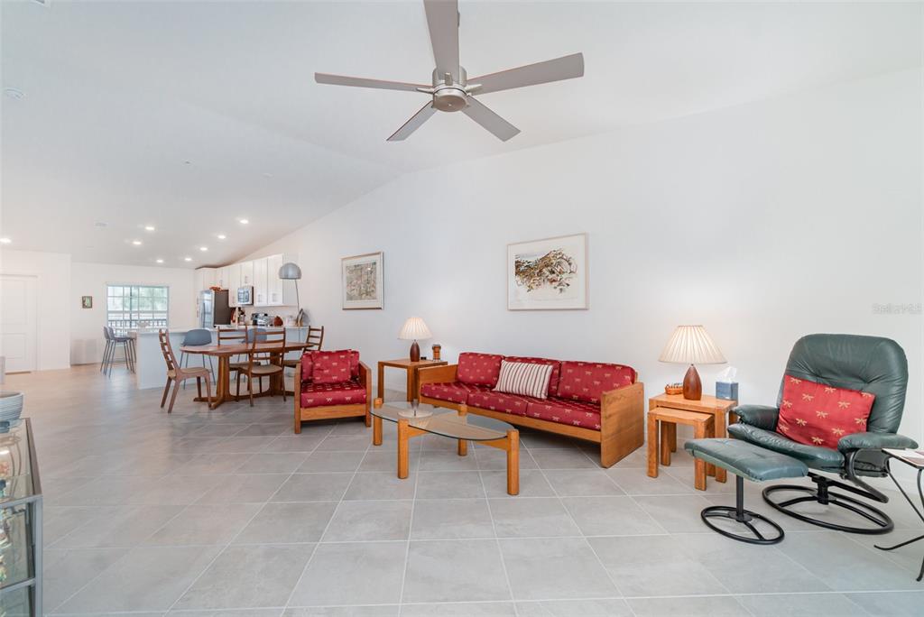 43992 Boardwalk Loop, Unit 1526 Punta Gorda, FL 33982 - Photo 9 of 48 a living room with lots of furniture and a couch