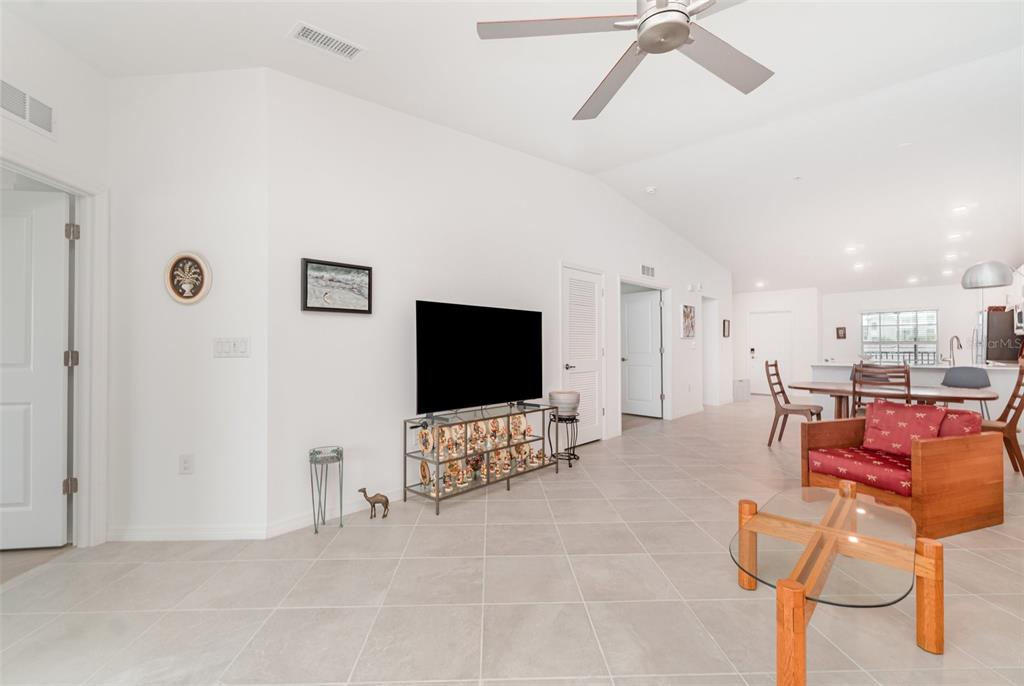 43992 Boardwalk Loop, Unit 1526 Punta Gorda, FL 33982 - Photo 10 of 48 a living room with furniture and a flat screen tv