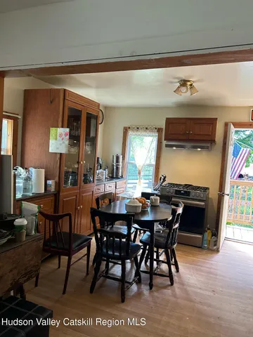 a view of a dining room with furniture