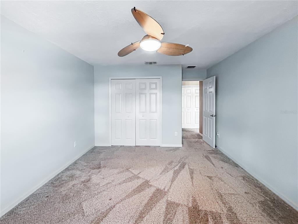 15598 Southwest 11th Terrace Road Ocala, FL 34473 - Photo 11 of 27 wooden floor in an empty room