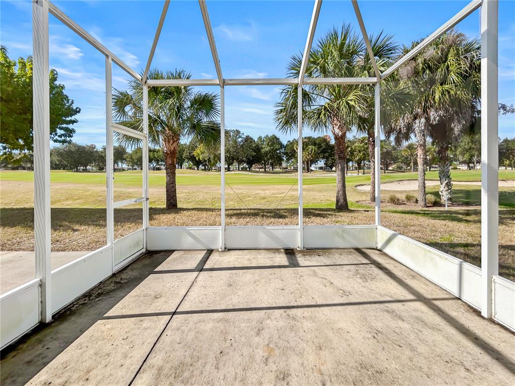 15598 Southwest 11th Terrace Road Ocala, FL 34473 - Photo 25 of 27 a view of empty room with windows and white walls